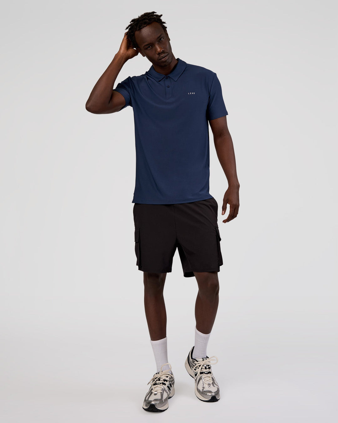 Man wearing Drive Polo - Future Navy | Model:Okello | Size:M