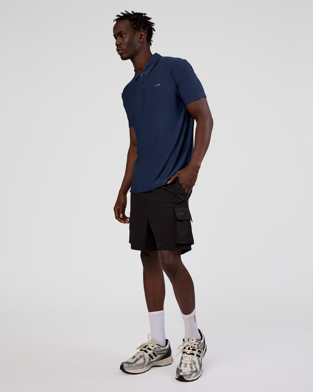 Man wearing Drive Polo - Future Navy | Model:Okello | Size:M