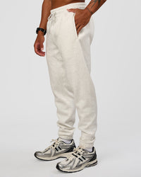 Man wearing MVP Cuffed Track Pant - Silver Marl | Model:Malebo | Size:M