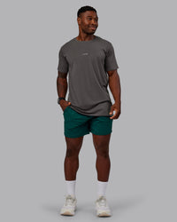 Man wearing Restore CloudFLX Short in Dark Moss | Size:M | Model:Sam