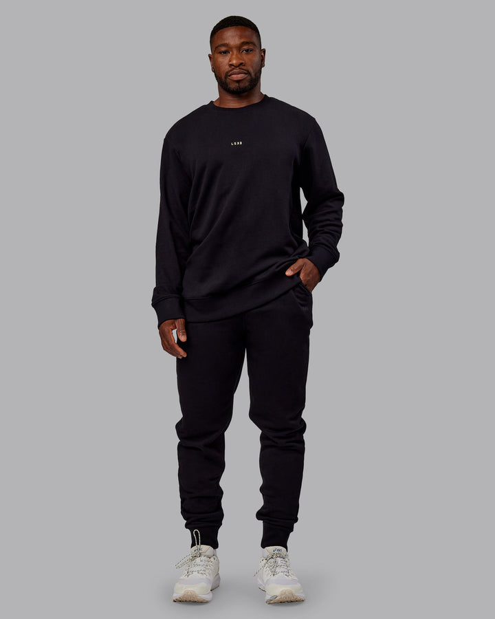 Man wearing Terry Track Pants - Black
