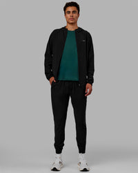 Man wearing Train-Lite FLXMAX Pants - Black