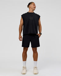 Man wearing Move Fast Heavyweight Boxed Tank - Black Washed | Model:Jaiden | Size:M