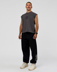 Man wearing Move Fast Heavyweight Boxed Tank - Dark Storm Washed | Model:Jaiden | Size:M