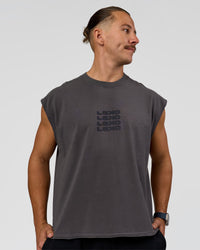 Man wearing Move Fast Heavyweight Boxed Tank - Dark Storm Washed | Model:Jaiden | Size:M