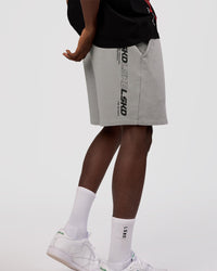 Man wearing Nothing Is Impossible 6" Short - Alloy-Black | Model:Okello | Size:M
