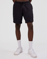 Man wearing Nothing Is Impossible 6" Short - Black-Flame | Model:Okello | Size:M