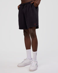 Man wearing Nothing Is Impossible 6" Short - Black-Flame | Model:Okello | Size:M