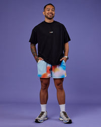 Man wearing Our Journey Heavyweight Oversized Tee - Black-Rainbow | Model:Justin | Size:M
