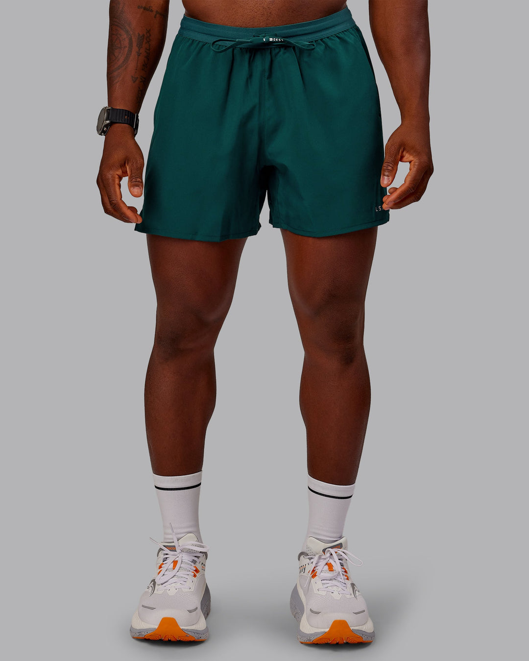 Man wearing Pace Lined Performance Short  5&quot; in Dark Moss | Size:M