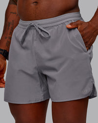 Man wearing Pace Lined Performance Short  5" in Storm Front | Size:M