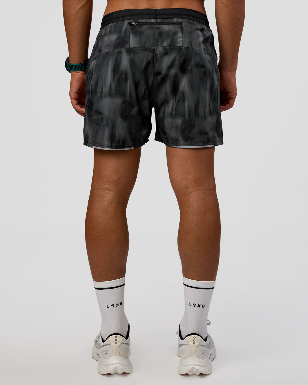 Man wearing Pace 5" Lined Running Short - Lunar Glow | Model:George | Size:M