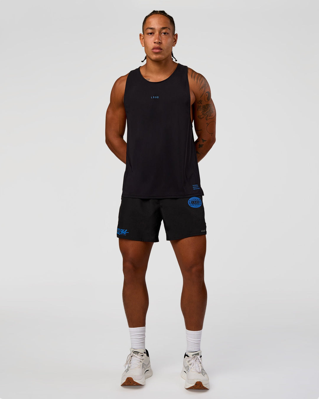 Man wearing Pace 5" Lined Running Short - Black-Palace Blue | Model:Malebo | Size:M