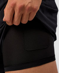 Man wearing Pace 5" Lined Ripstop Short - Black | Model:Liam | Size:M |