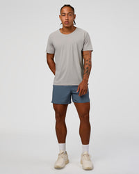 Man wearing Pace 5" Running Short - Blue Mirage | Model:Malebo | Size:M