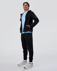 Man wearing Pace Running Jacket - Black | Model:Konnor | Size:M