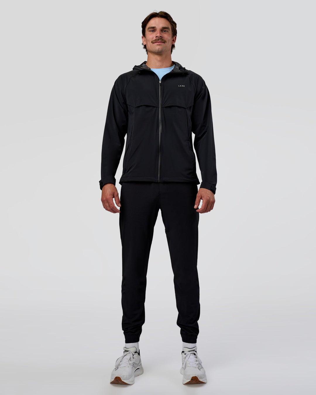 Man wearing Pace Running Jacket - Black | Model:Konnor | Size:M