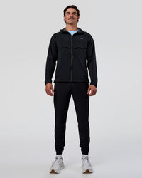 Man wearing Pace Running Jacket - Black | Model:Konnor | Size:M