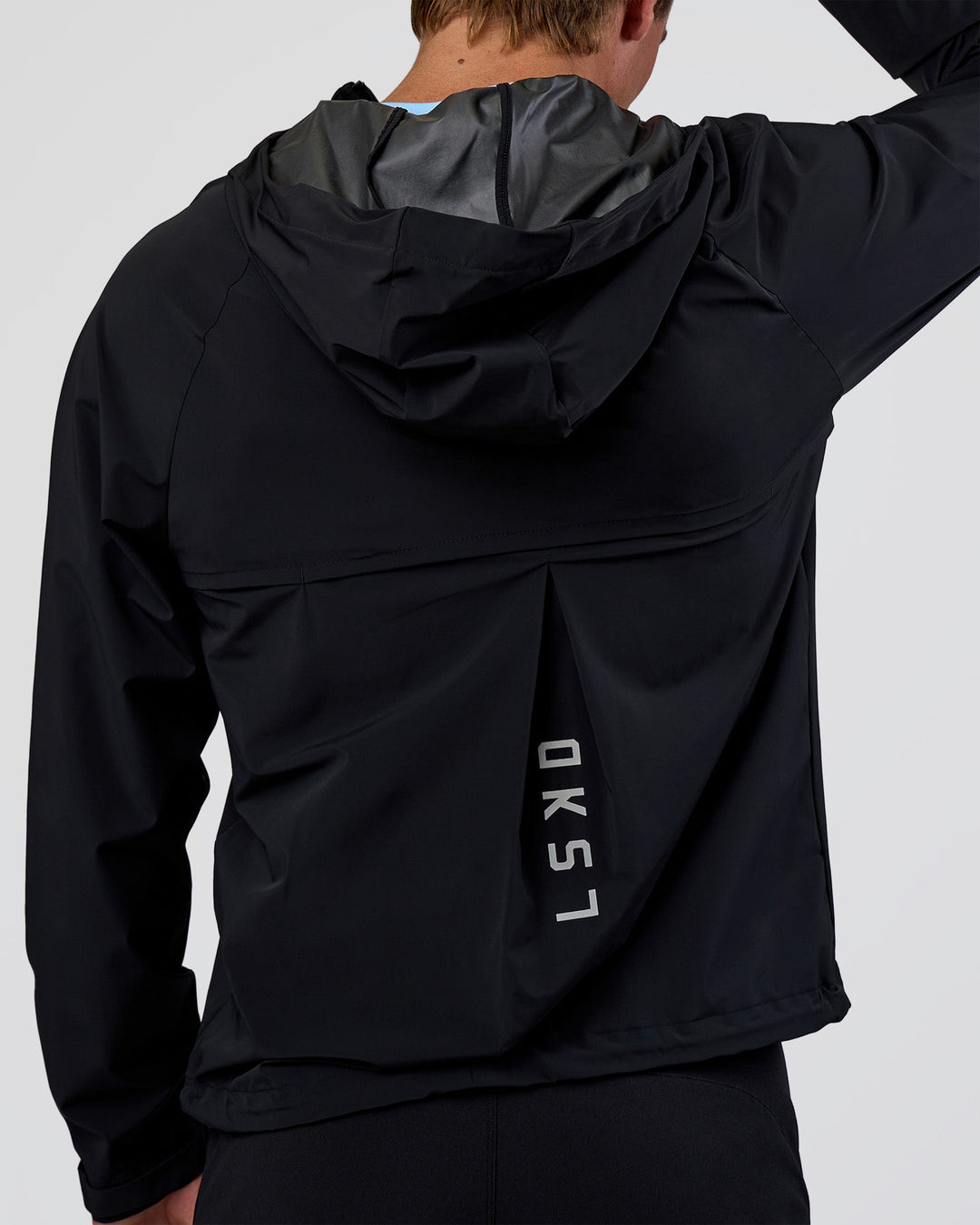 Man wearing Pace Running Jacket - Black | Model:Konnor | Size:M