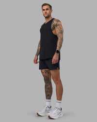 Man wearing Pace Running Tank - Black | Model:Tommy | Size:M