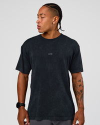 Man wearing Power Oversized Tee - Black Washed | Model:Malebo | Size:M
