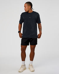 Man wearing Power Oversized Tee - Black Washed | Model:Malebo | Size:M