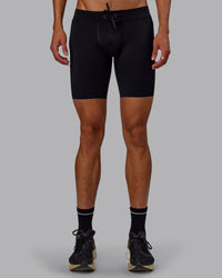 Man wearing Race Day Short Tight 8" in Black | Model:Jaxon | Size:M
