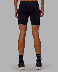 Man wearing Race Day Short Tight 8" in Black | Model:Jaxon | Size:M