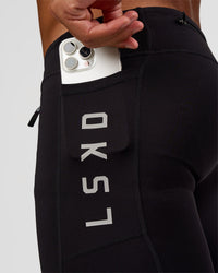 Man wearing Race Day 8" Short Tight - Black-Alloy | Model:Malebo | Size:M