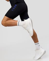 Man wearing Race Day 8" Short Tight - Black-Electric Indigo | Model:Albert | Size:M |