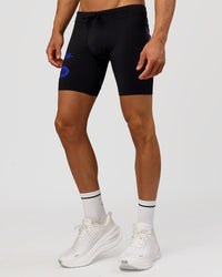 Man wearing Race Day 8" Short Tight - Black-Electric Indigo | Model:Albert | Size:M |