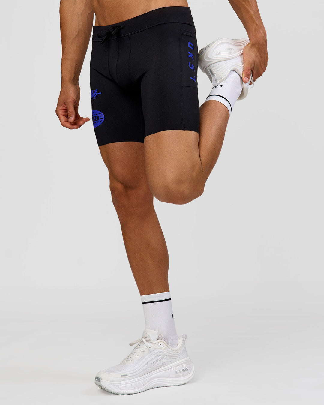 Man wearing Race Day 8" Short Tight - Black-Electric Indigo | Model:Albert | Size:M |