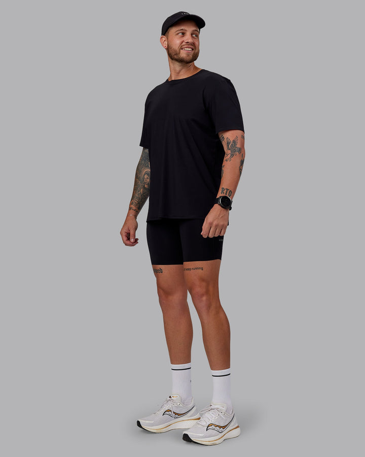 Man wearing Race Day Short Tight 8&quot; in Black | Size:M
