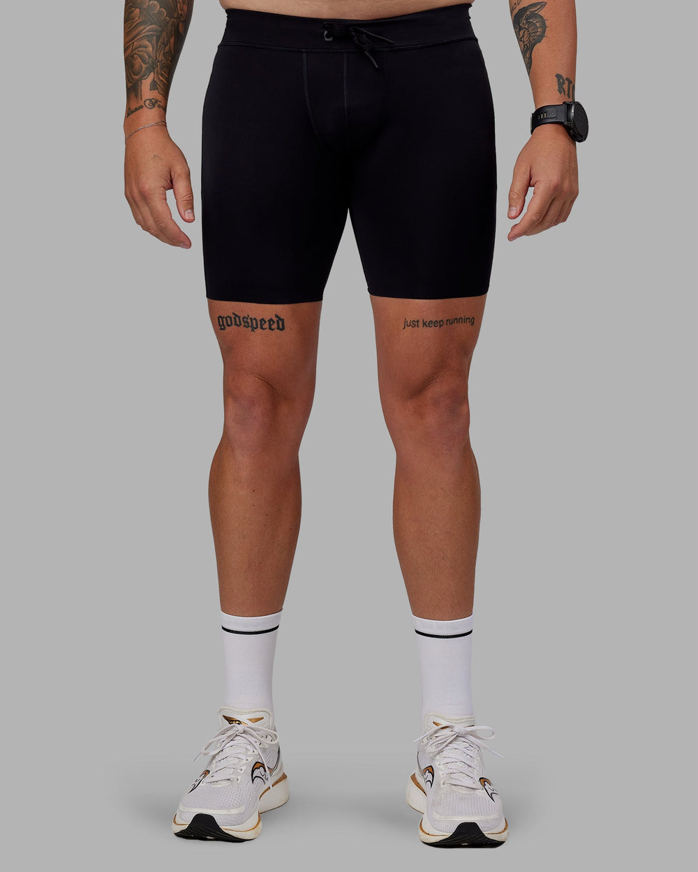 Man wearing Race Day Short Tight 8" in Black | Size:M