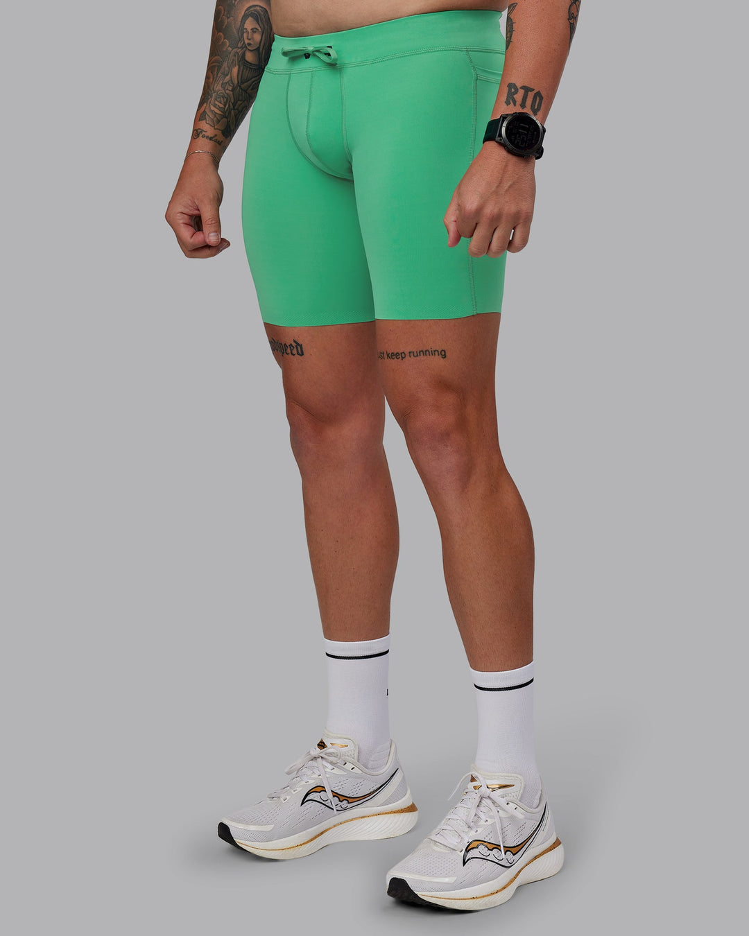 Man wearing Race Day Short Tight 8&quot; in Mystic Green | Size:M