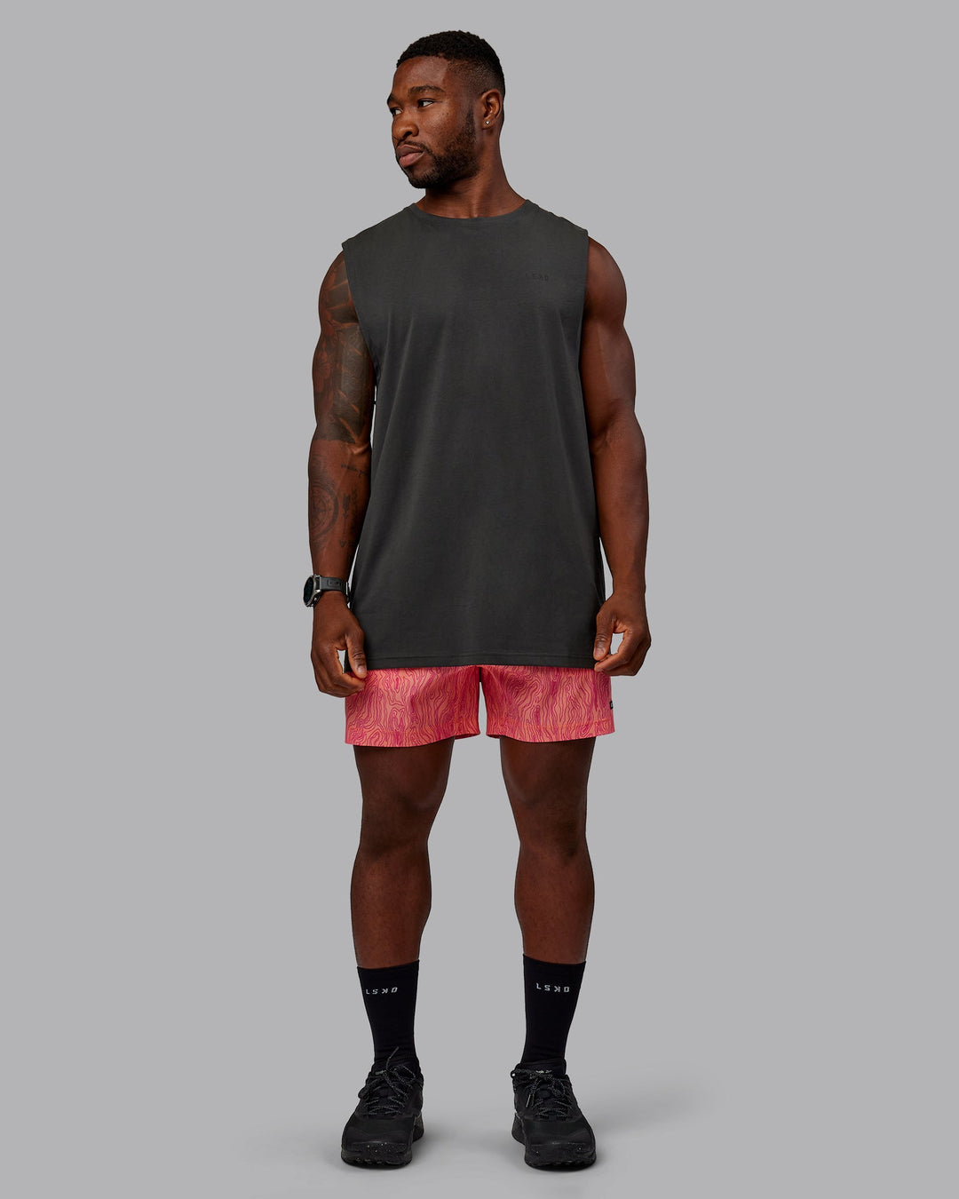 Man wearing Rep 5&quot; Performance Shorts - Topographic Peach