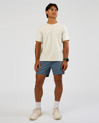 Man wearing Rep 5" Performance Short - Blue Mirage | Model:George | Size:M