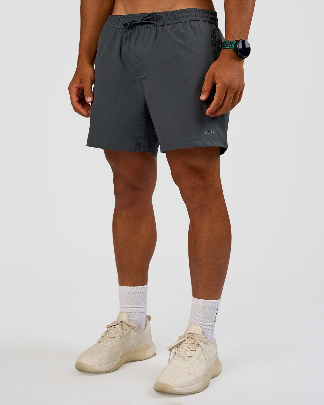 Man wearing Rep 5" Performance Short - Dark Storm | Model:George | Size:M