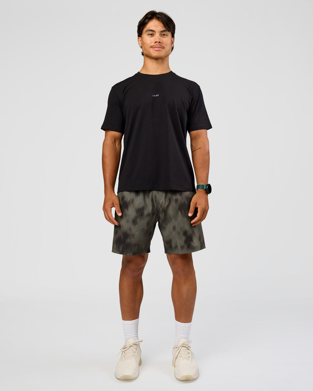 Man wearing Rep 7" Performance Short - Camo Washed Walnut Grey | Model:George | Size:M