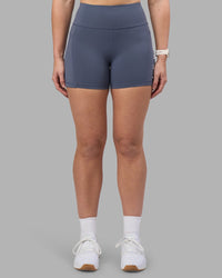 Woman wearing Rep Ultra High-Rise 4" Short Pockets - Night Shadow-White | Model:Amy | Size:M