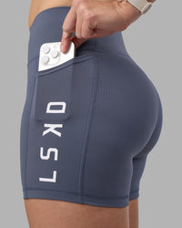 Woman wearing Rep Ultra High-Rise 4" Short Pockets - Night Shadow-White | Model:Amy | Size:M