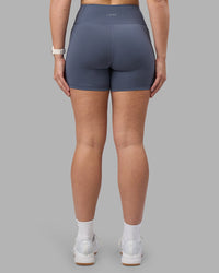 Woman wearing Rep Ultra High-Rise 4" Short Pockets - Night Shadow-White | Model:Amy | Size:M