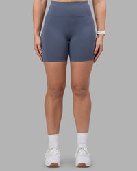 Woman wearing Rep Ultra High-Rise 6" Short Pockets - Night Shadow-White | Model:Amy | Size:M