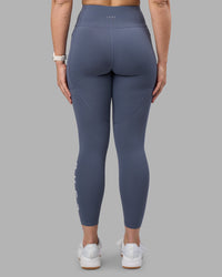 Woman wearing Rep Ultra High-Rise 7/8 Legging Pockets - Night Shadow-White | Model:Amy | Size:M