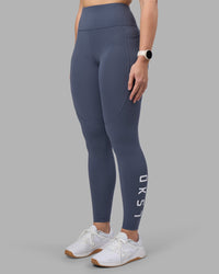 Woman wearing Rep Ultra High-Rise Full Length Legging Pockets - Night Shadow-White | Model:Amy | Size:M