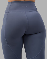 Woman wearing Rep Ultra High-Rise Full Length Legging Pockets - Night Shadow-White | Model:Amy | Size:M