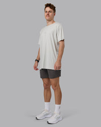 Man wearing Restore CloudFLX Short - Dark Storm | Model:Cameron | Size:M