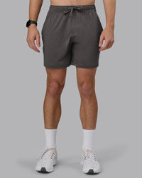Man wearing Restore CloudFLX Short - Dark Storm | Model:Cameron | Size:M