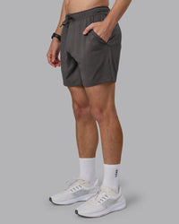 Man wearing Restore CloudFLX Short - Dark Storm | Model:Cameron | Size:M