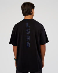 Man wearing Run Club Script FLXCotton Oversized Tee - Black-Palace Blue | Model:George | Size:M
